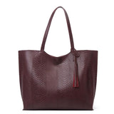 Fashion wave snake pattern handbag